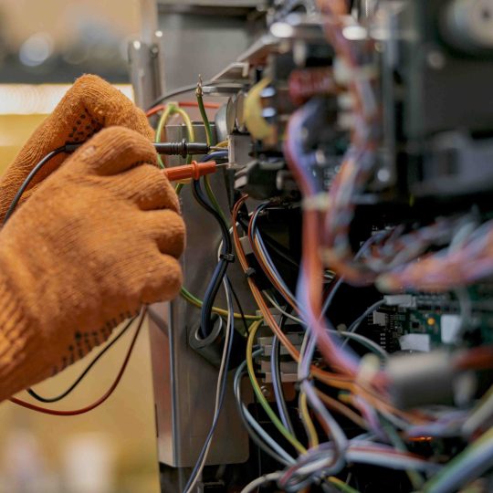 male-electrician-hands-repairing-coffee-machine-in-2026-01-08-22-01-14-utc_11zon